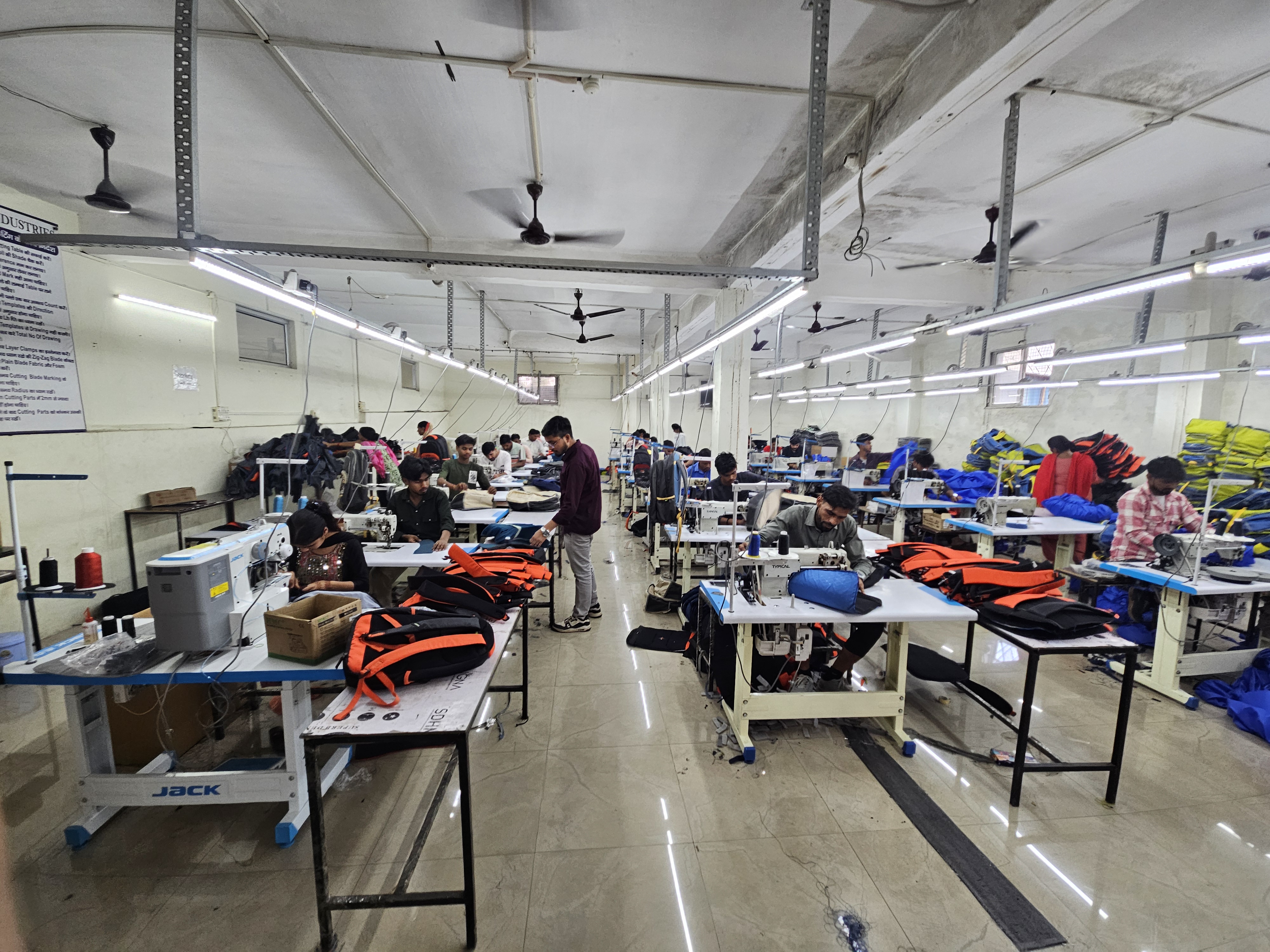 Workers on the Busta shop floor during production